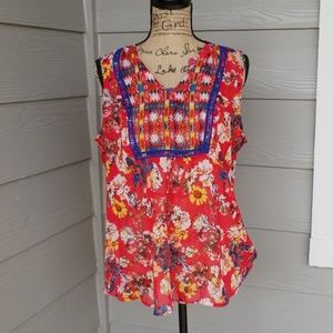 Red floral sleeveless blouse